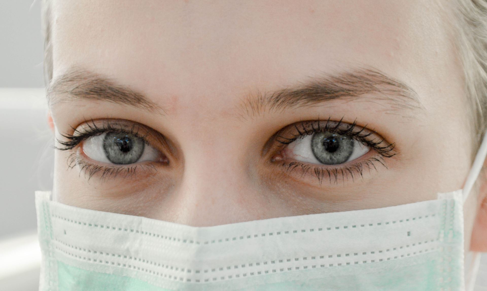 eyes of nurse wearing a mask